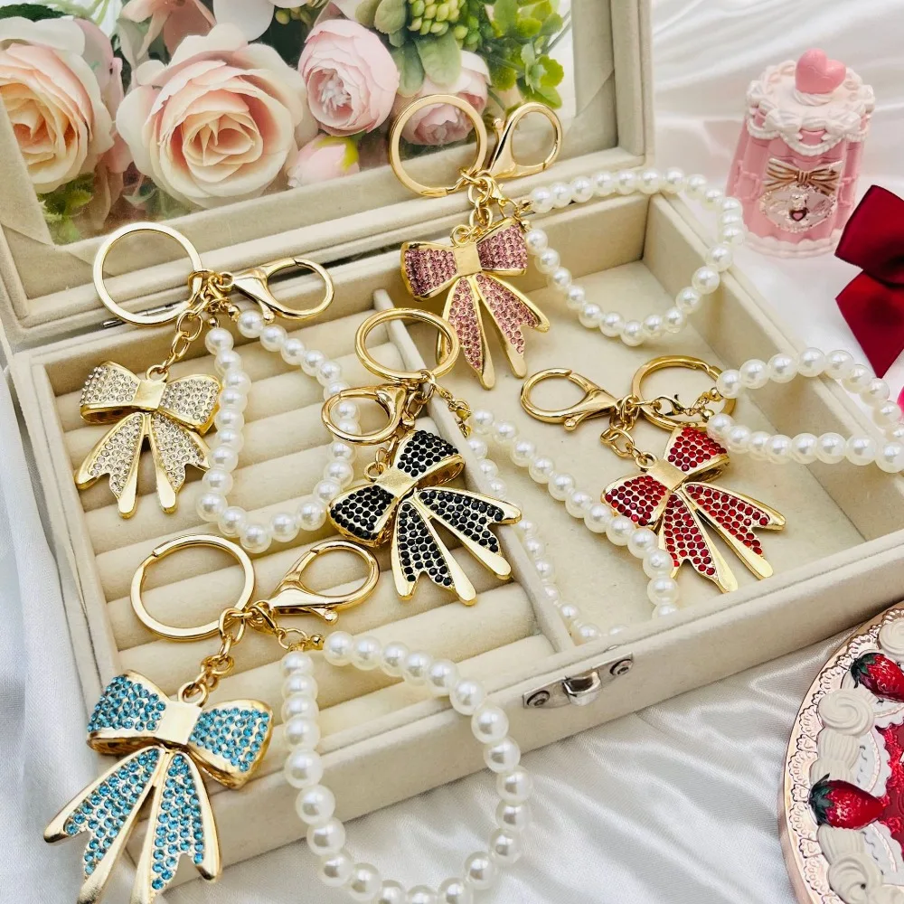 

Sweet Butterfly Key Chain Bow Pearl Diamond Keyring Bag Pendant Fashion Key Ring Car Charm Shiny Decor Wholesale Keychain Gift