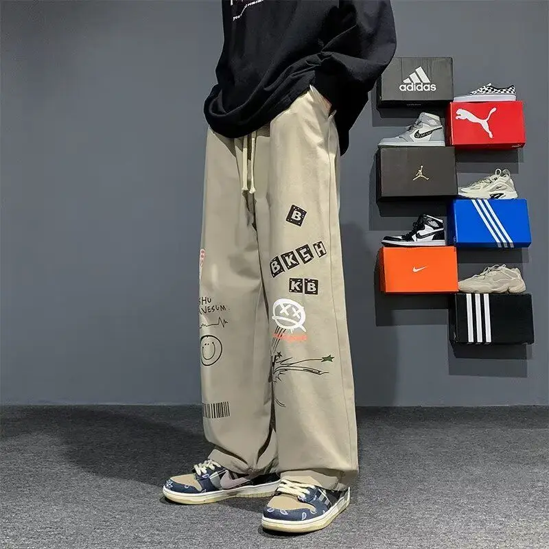

2025 Spring and Summer New Japanese Graffiti Printed Work Pants for Men's Casual Trousers Straight Loose Draped Wide-leg Pants