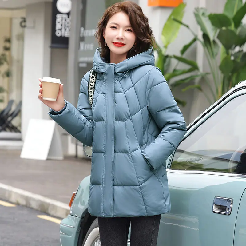 Cappotto moda con cappuccio imbottito in tinta unita con tasca grande autunno nuovo Cappotto imbottito in cotone leggero lungo Joker da donna taglie forti