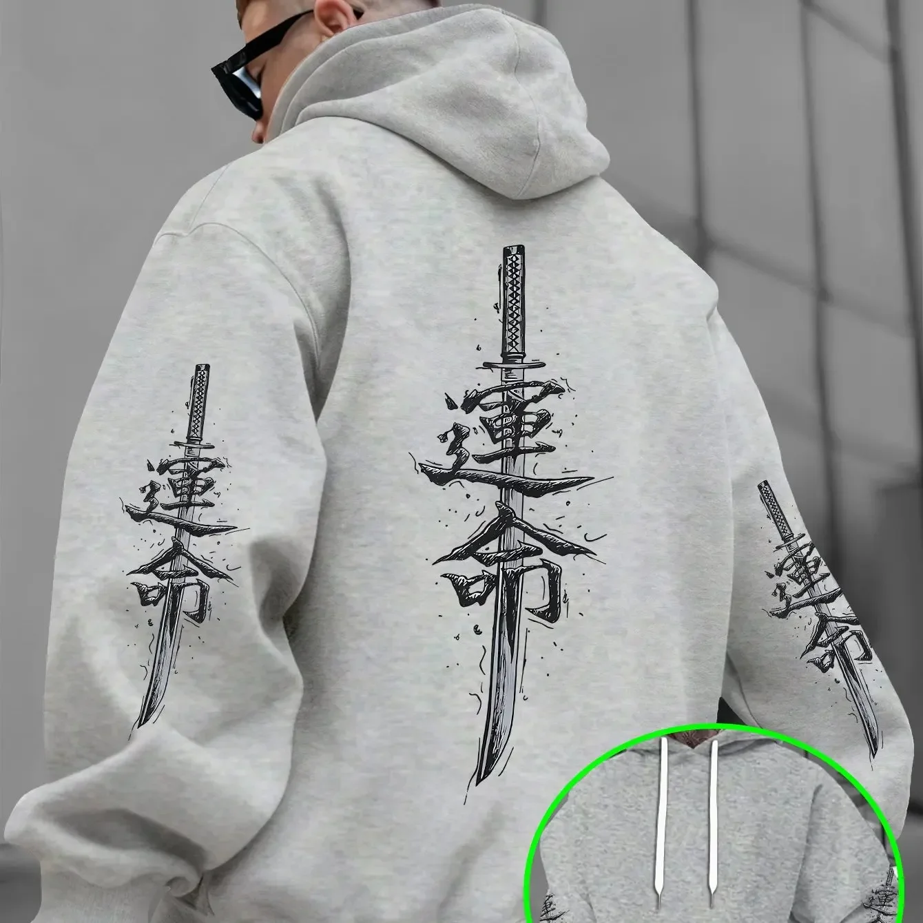 Men's long-sleeve hoodie featuring a vertical Chinese character and samurai sword print—casual style for autumn and winter.
