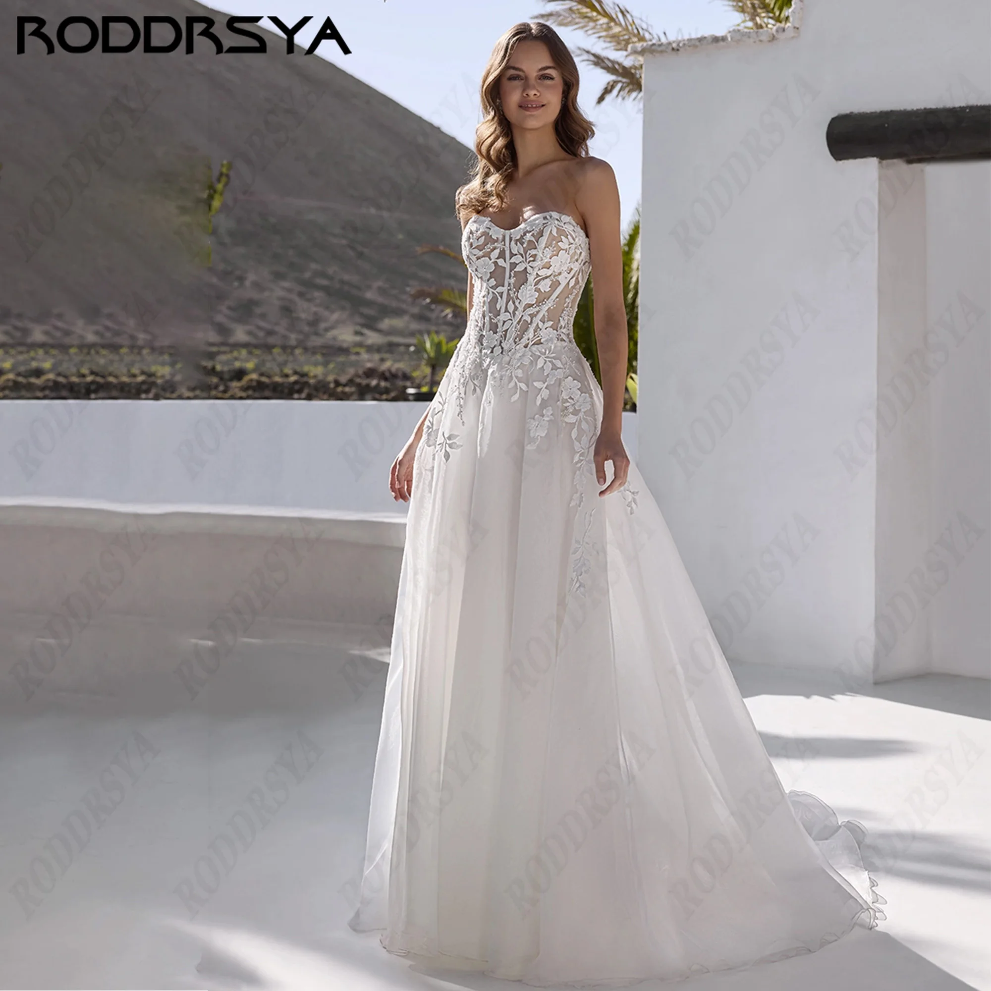 RODDRSYA vestido de novia personalizado con perlas sin tirantes Tullo vestido de novia A-línea corte tren elegante encaje aplicados vestido de novia playa luna de miel pura cuerpo artesanal 2026 falda fluida