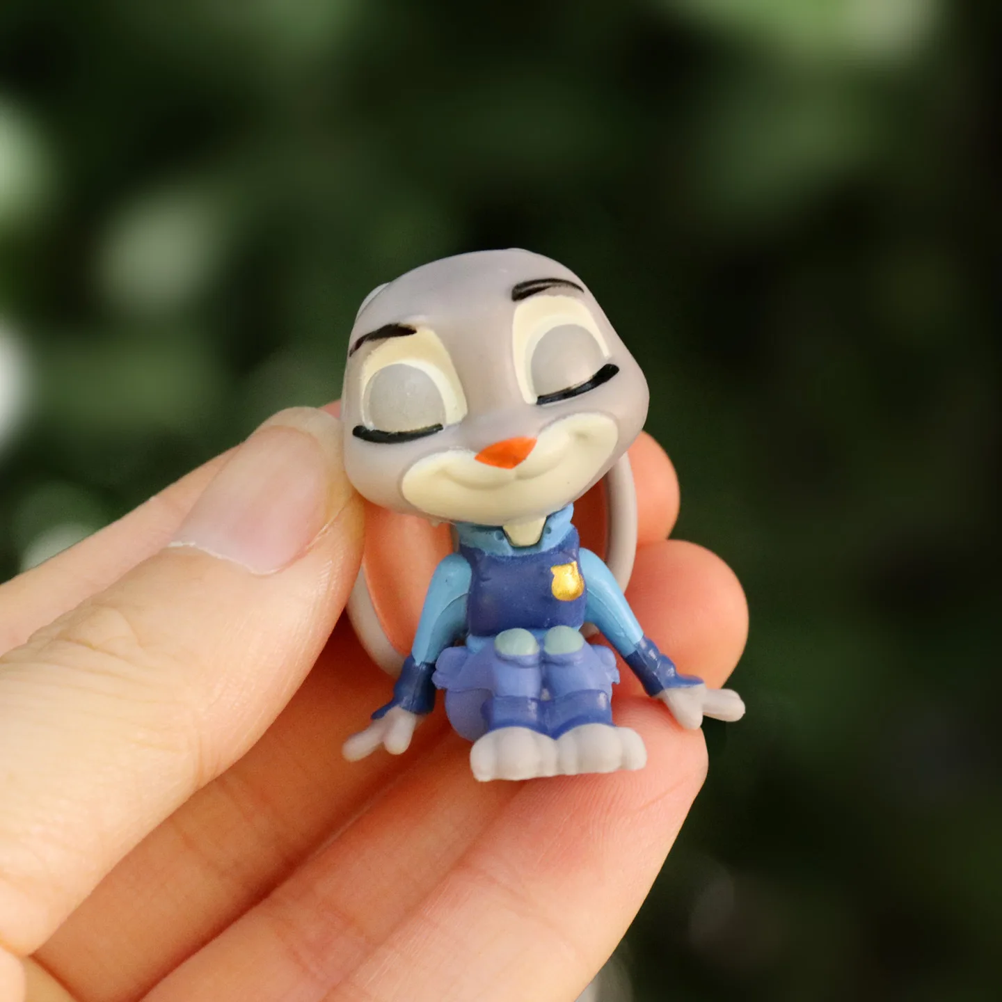 Nuovo prodotto seduto obbedientemente nella città degli animali, bambole di piccoli animali, decorazioni creative per auto da tavolo, ornamenti