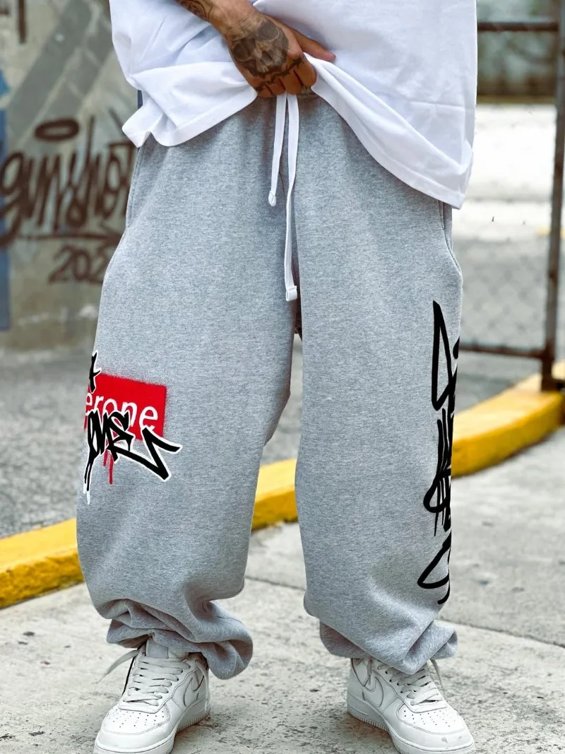 

Y2K trendy Harajuku oversized letter pattern loose drawstring casual pants American retro hip-hop Gothic rock men pants