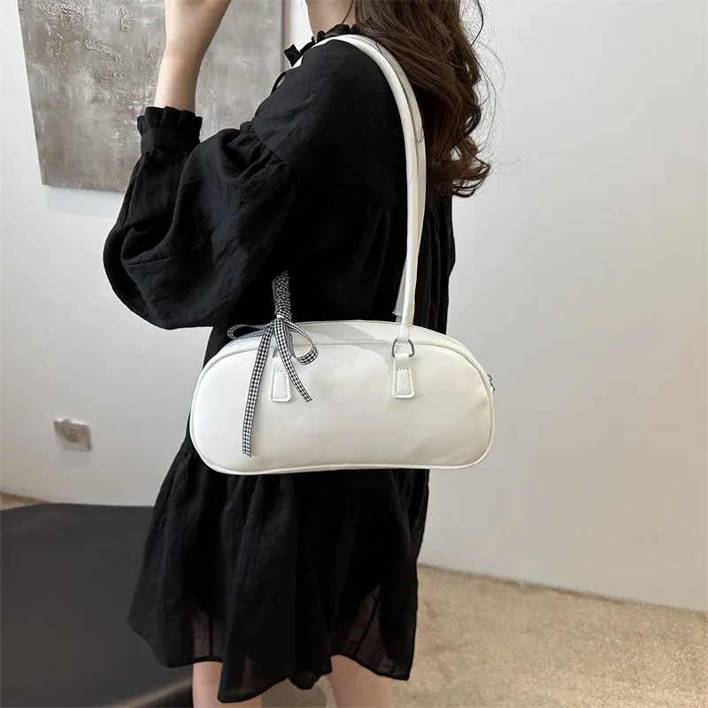 

Korean version of the fashion sweet bow handbag handbag female 2025 new niche design armpit bag large capacity