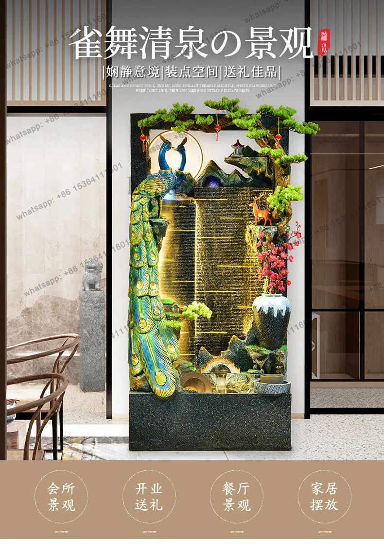 Rockery fountain flows with circulating water, indoor and outdoor decorative landscaping, and a floor-to-ceiling fish pond