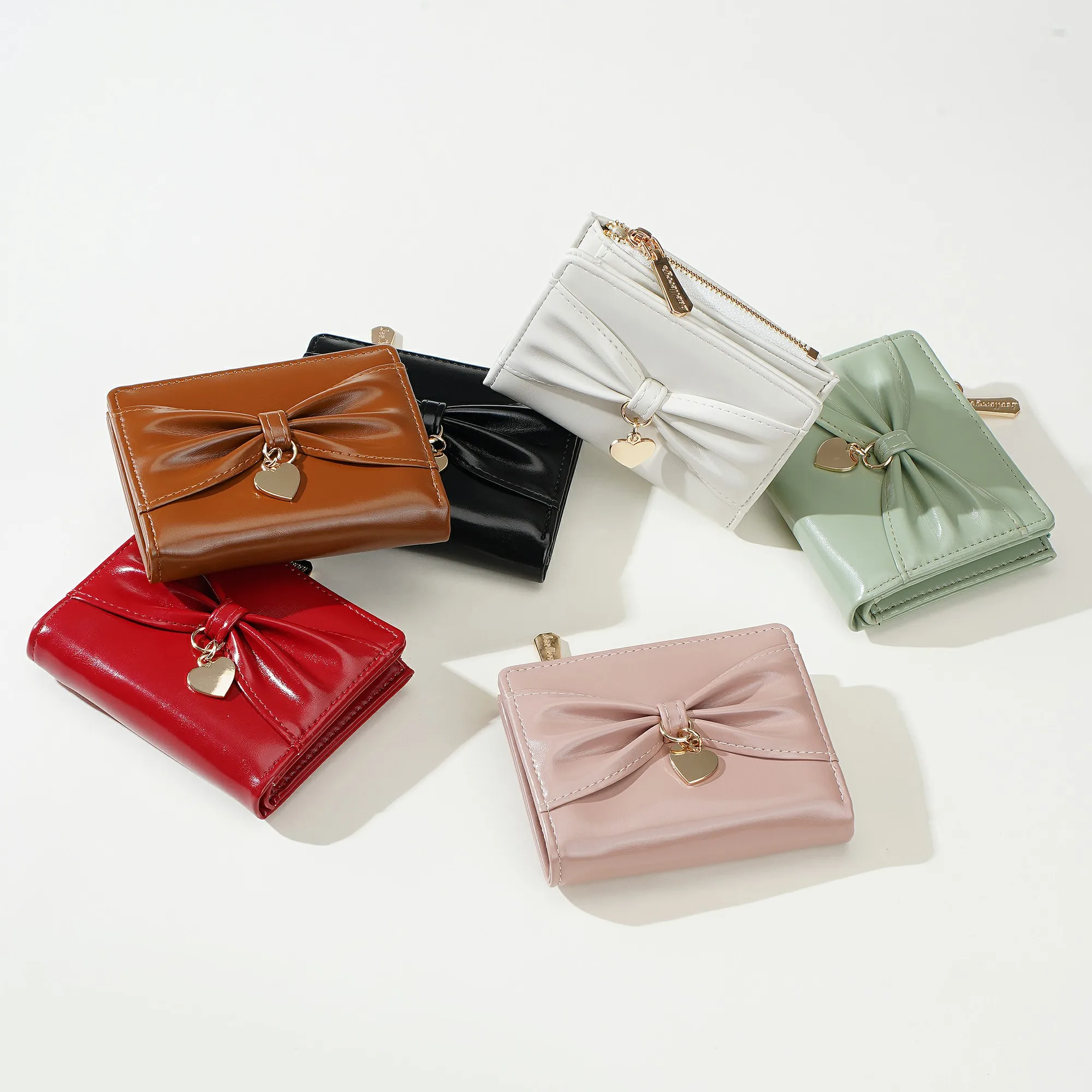 1 Stück Damen-Mini-Geldbörse mit Schleifenmuster, tragbare Münztasche in Herzform, leichte Taschen-Geldbörse für Reisen und Urlaub, einfarbige, minimalistische Kartenhülle, süße Geldbörse in Dopamin-Farben für Mädchen, das perfekte Geschenk für Mädchen. – Detail 16