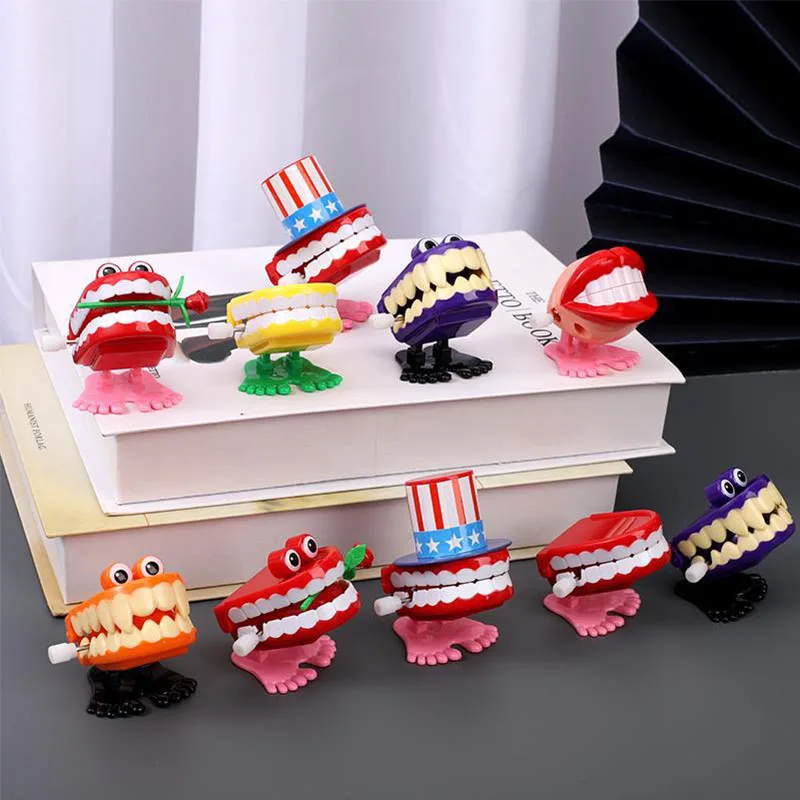 1PC Novelty Children Clockwork Toy Upper Chain Jumping Tooth Toy Jump Teeth Running Clockwork Spring Wind Up Toy Dentist Gifts