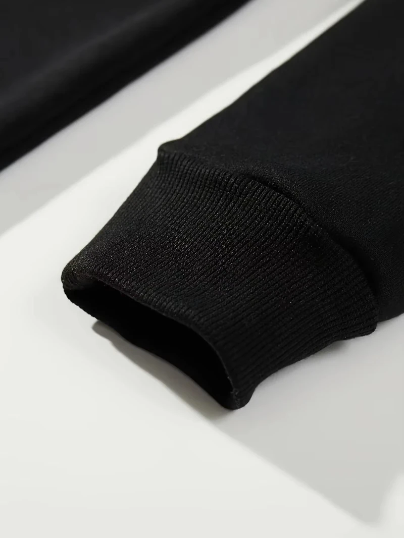 في خريف وشتاء 2025، قمصان شعبية غير رسمية ورياضية للزوجين فضفاضة برقبة دائرية وأكمام طويلة