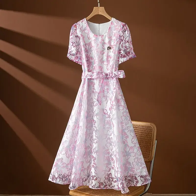 

Pink print dress female 2024 summer new floral elegant luxury temperament atmosphere tie waist slim short sleeve skirt.