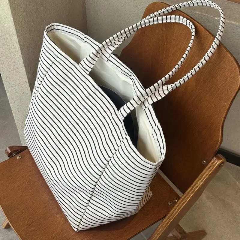 

Fashion Korean Striped Shoulder Tote Bag with Stylish Design for Commuting and Large Capacity Storage Bags