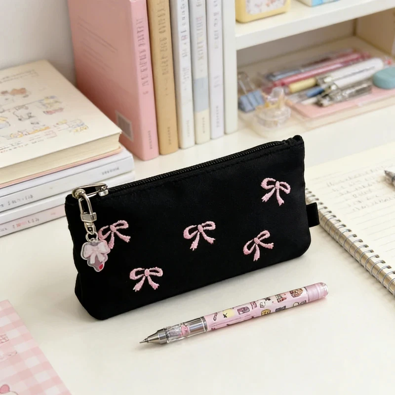 Estuche para lápices con lazo negro bordado, de aspecto excepcional, estilo sencillo, se puede usar como bolsa para guardar maquillaje, para el regreso a clases.