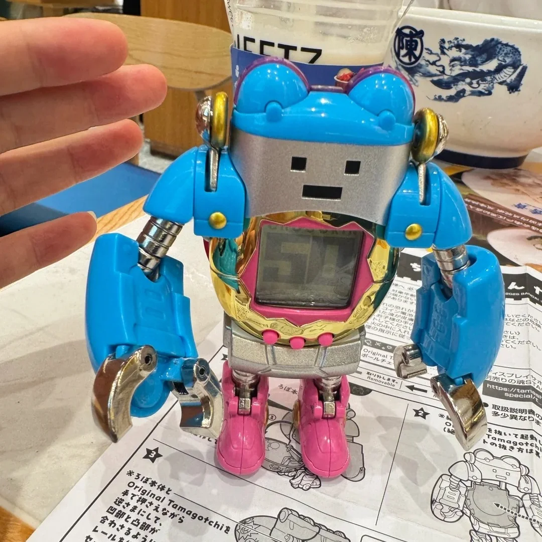 本物のバンダイ超合金たまごっち変形ロボットモデル変形能力 10 センチメートルアクションフィギュア模型玩具