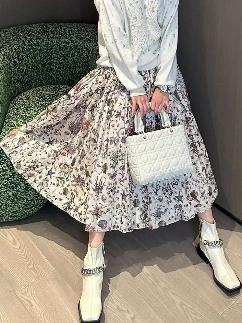 

Новая юбка А-силуэта в клетку из ткани «слэ» с высокой талией, миди, в корейском стиле, для офиса и повседневной носки, с плиссировкой и широким подолом, весна 2025