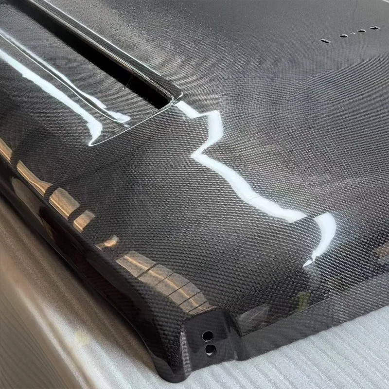 Modificação da tampa de fibra de carbono