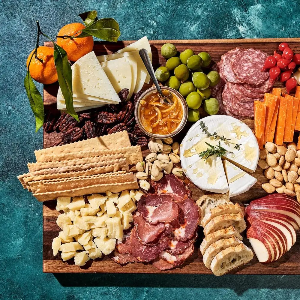 เขียงไม้วอลนัทสองด้านพร้อมร่องน้ำและหูจับ ขนาด 13.75x19.5 นิ้ว ทนทานและป้องกันรอยขีดข่วน