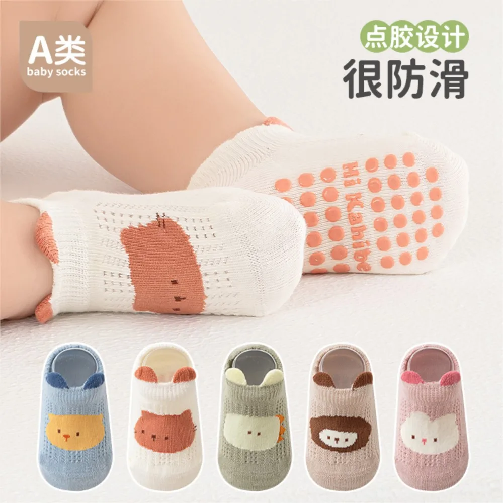 

Children's boat socks spring and summer combed cotton mesh breathable baby socks boneless ear glue anti-slip floor socks.