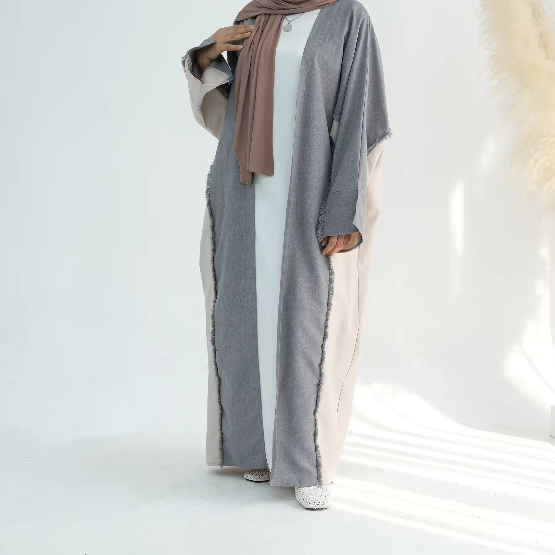 UAE Style Patchwork Muslim Abaya Belted Waist Functional Pockets Ideal for Dubai Inspired Modest Fashion Daily Social Occasions