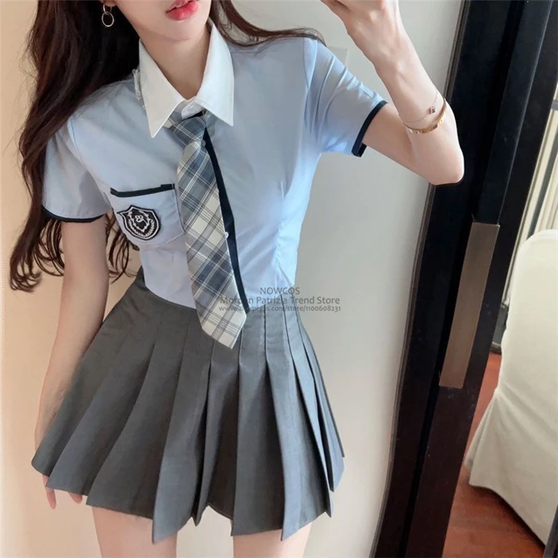 Uniforme da studente coreana giapponese Set uniforme scolastica JK stile College camicia blu a maniche corte cravatta gonna a pieghe a vita alta grigia