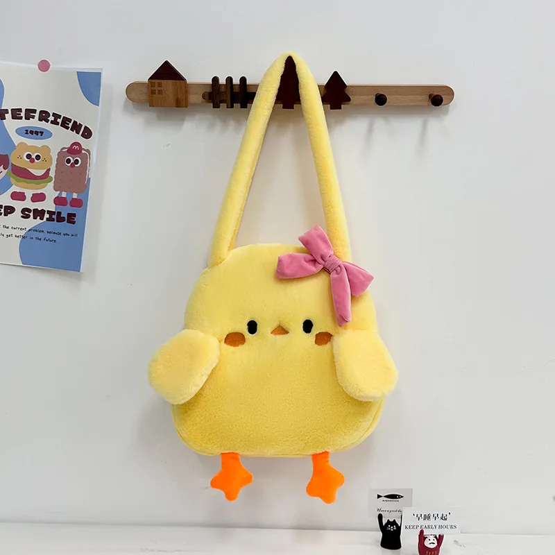 Cartoon Plush Stuffed Small Yellow Duck Bow Shoulder Bag 2025 New Versatile Children Plush Handheld Animal Bag Birthday Gifts