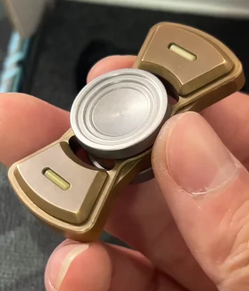 

THRAXX MINI Two Page Fingertip Gyroscope EDC Decompression Toy