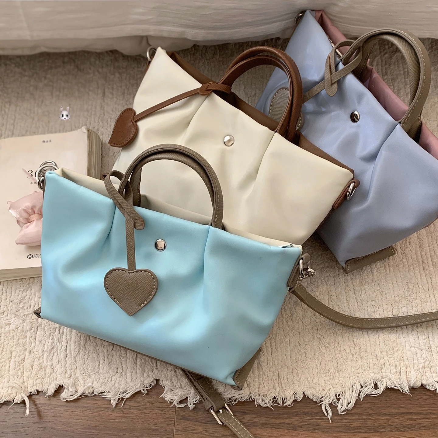 Niche texture women's handbag 2026 new contrasting color tote bag simple and versatile shoulder messenger bag