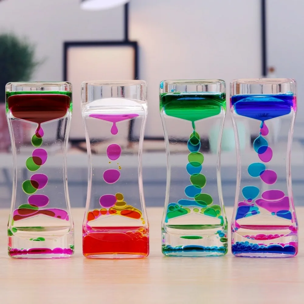 

Creative Home Furnishings Handicraft Small Dynamic Hourglass Desk Toy Therapeutic Focus Game Home Decore Ornaments Home Modern