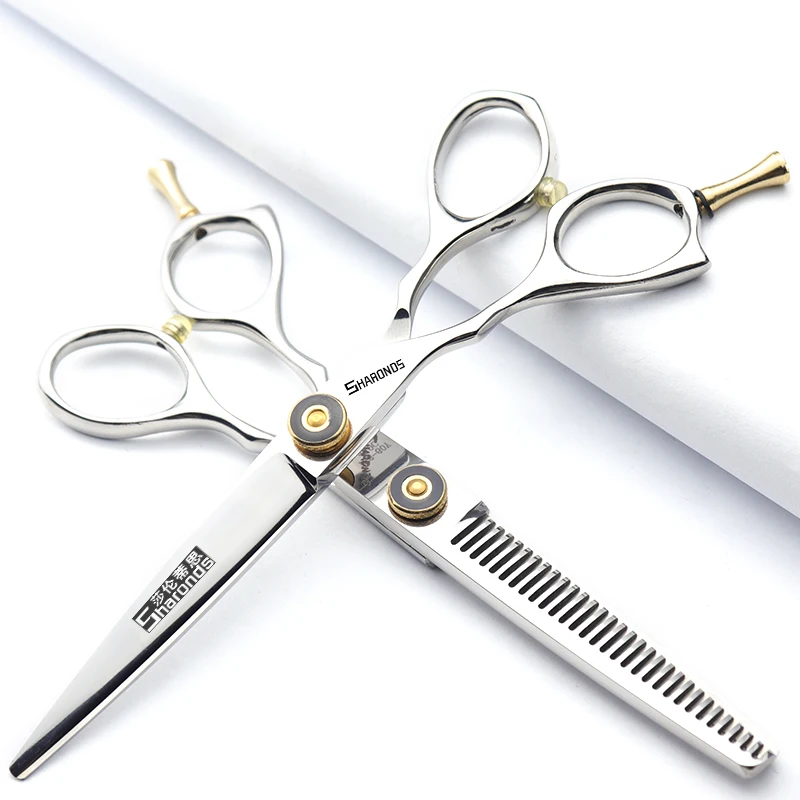 Hair salon hairstylist's left hand hair clippers, 5.5-inch 6-inch flat clippers, thinning hair fragments, and tooth clippers set