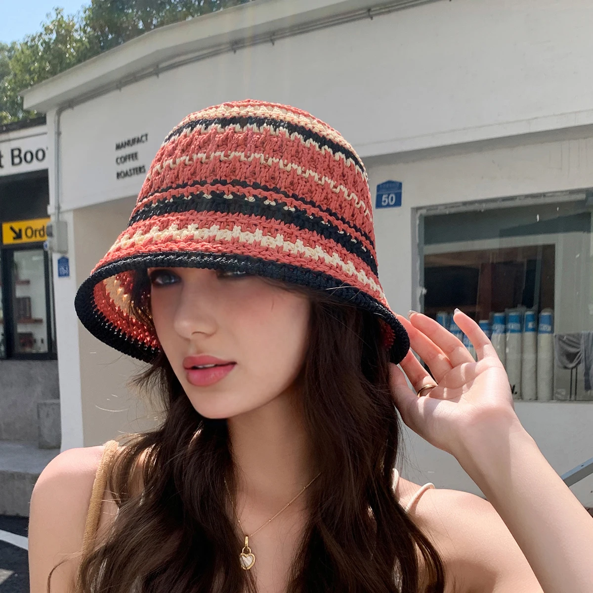 1 women\'s colorful striped knitted hollow hat that can be folded for outdoor travel and sun protection