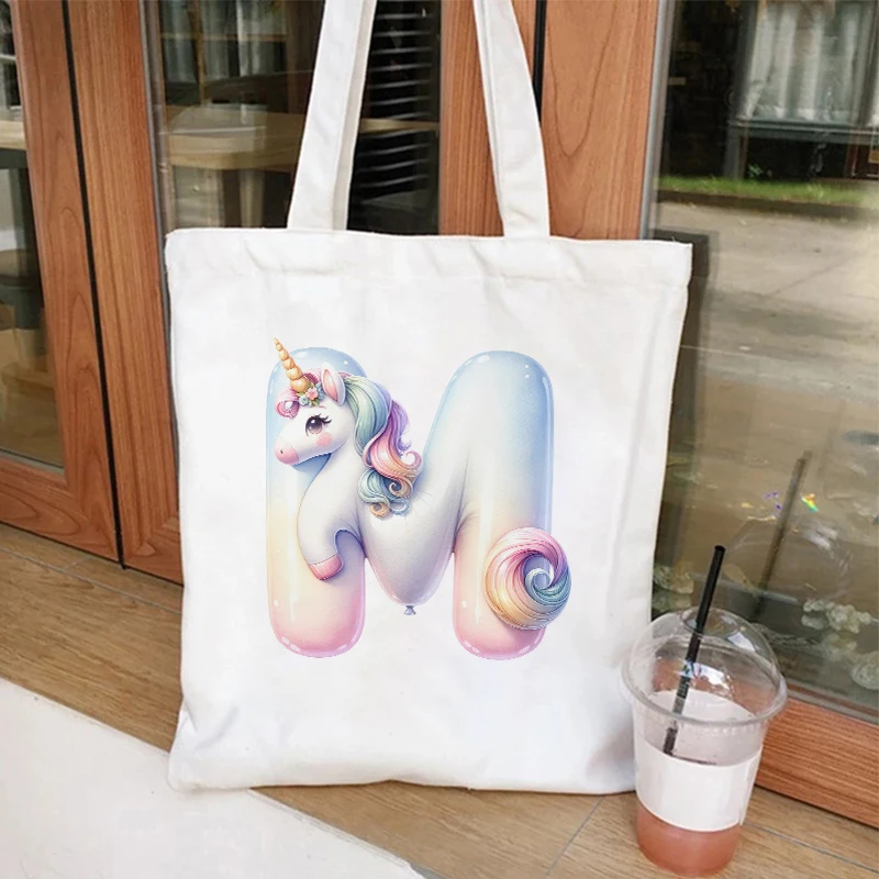 Unicorn Graphic 26 Alphabet Canvas Shoulder Bag donna A-Z lettere Shopping Bag Vintage Fashion Casual Teenager Tote Commuter Bag