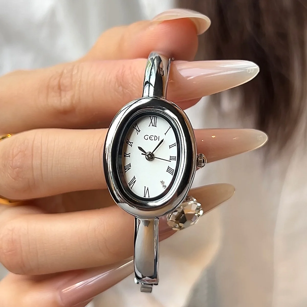 Luxury Brand Oval Silver Bracelet Design Women's Watch Roman Scale Dial Waterproof Quartz Rhinestone Watch Gift