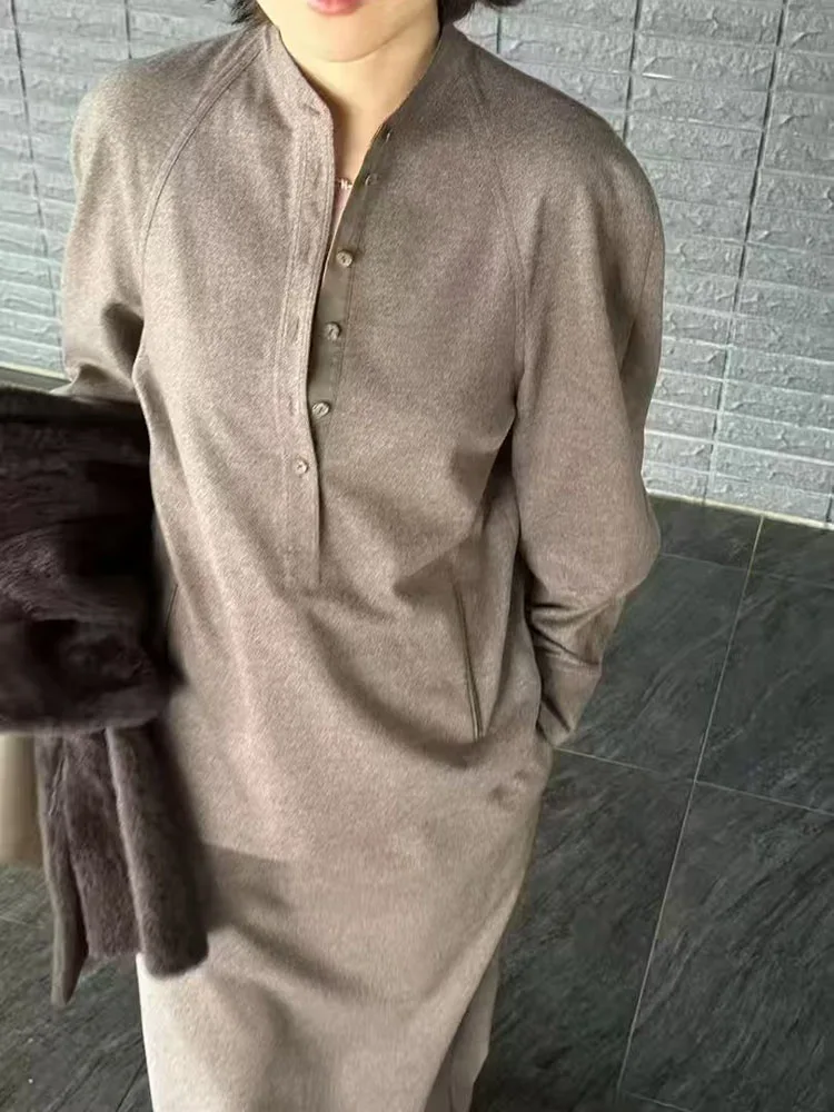 

A simple and casual style top for women with a stand-up collar, semi-opening, long-sleeved and loose shirt in autumn