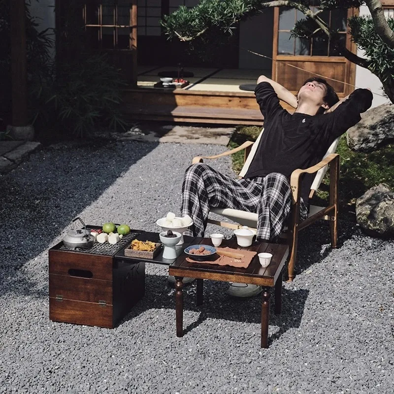 

Outdoor camping wooden stove, picnic camp barbecue grill