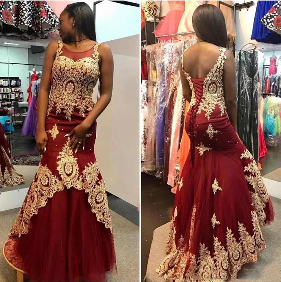 

Stunning Burgundy With Gold Appliques Pageant Prom Dresses 2023 Mermaid Jewel Sheer Neck Backless Corset Celebrity Evening Gowns