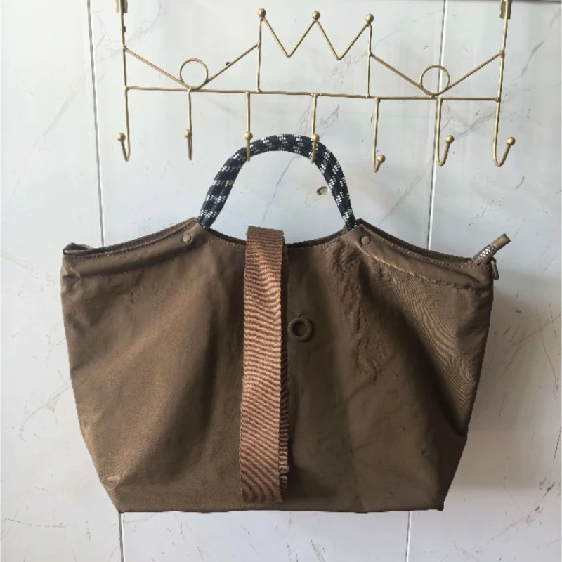 26ss New Japanese Canvas Tote Bag Women Large Capacity Commuter Handbag Casual Versatile Crossbody Shoulder Bag