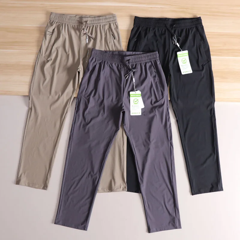 

Ультратонкие спортивные брюки из ледяного шелка, мужские спортивные брюки для улицы, тихосохнущие дышащие эластичные повседневные брюки с поясом, модные городские брюки...