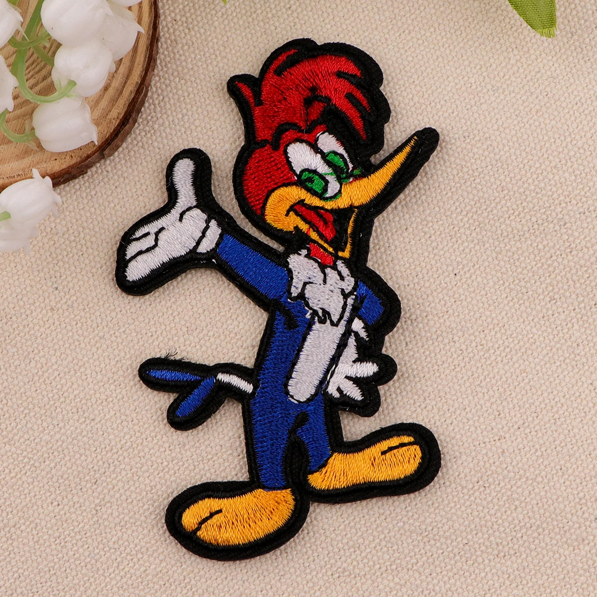 Рисунок 5 - Нашивка с вышивкой мультяшных животных для одежды