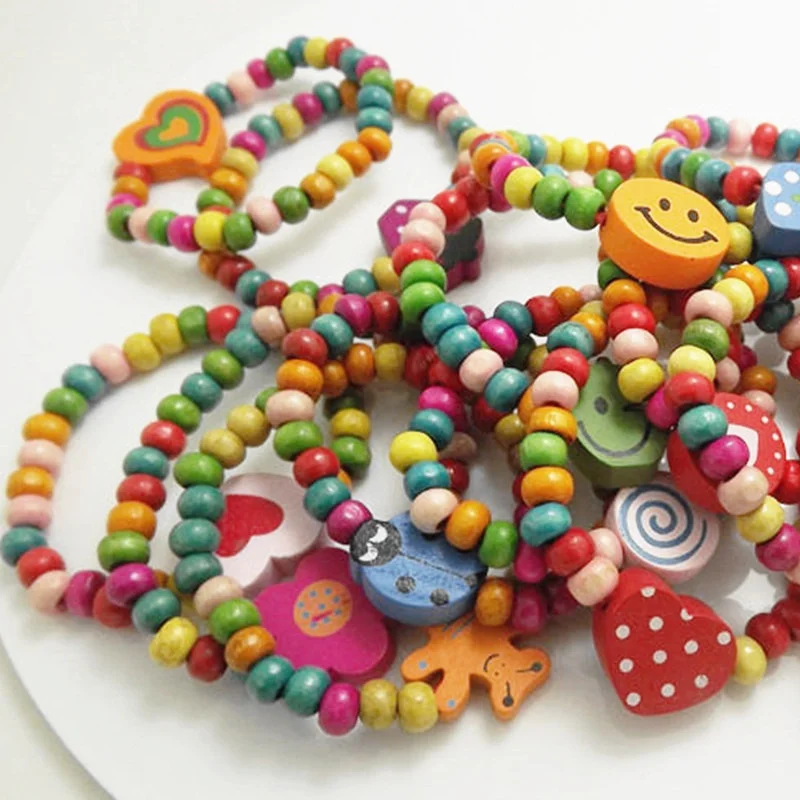 

Wholesale 18 pcs of wooden colorful children's bracelets, cute girls' bead bracelets, holiday accessories, cute small ornaments
