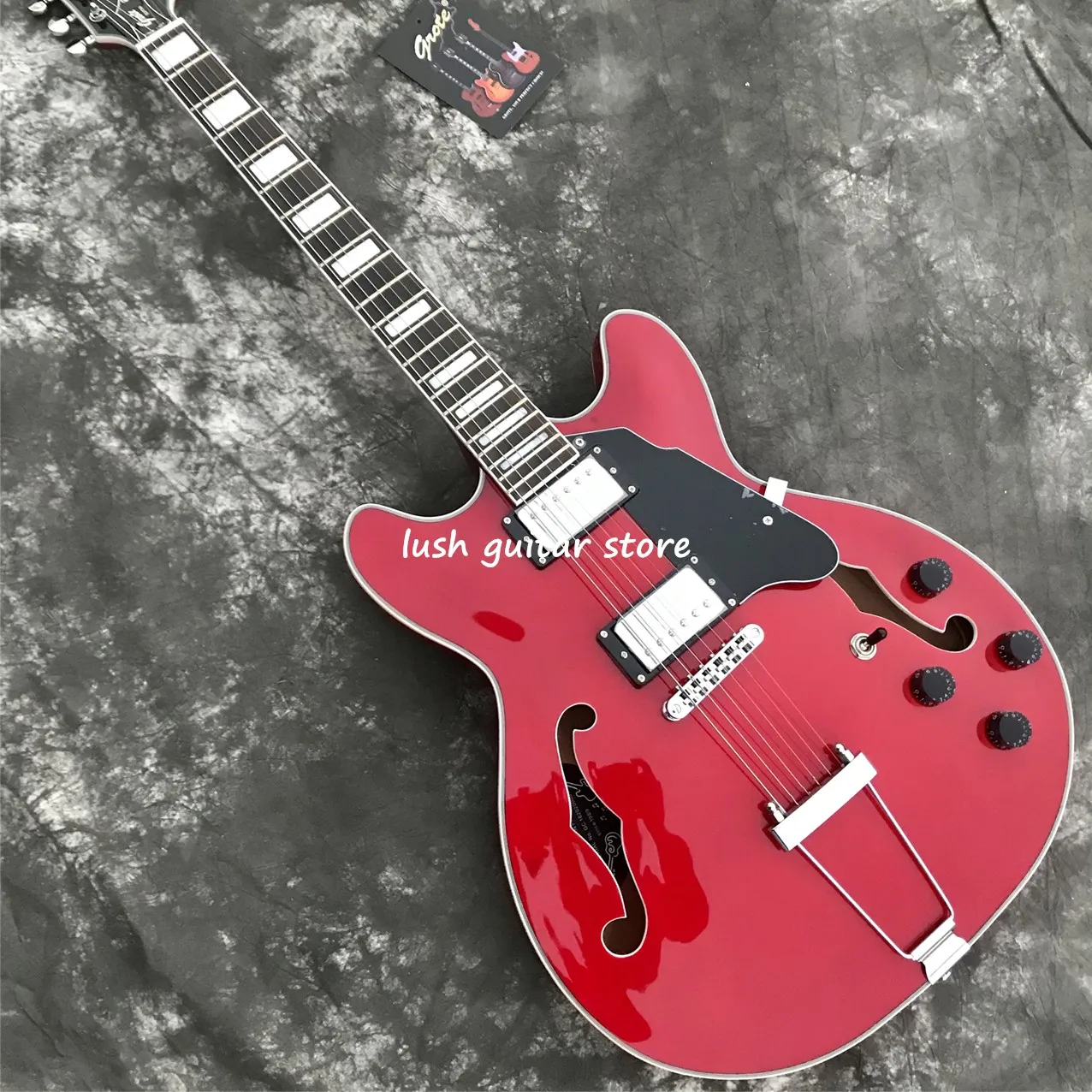 

Новинка 2023, красная электрическая гитара Grote China, модель Jazz с полым корпусом, черная накладка, бесплатная доставка