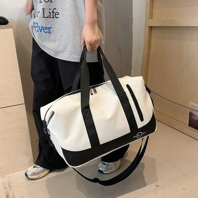 Moda cor sólida pu tamanho grande saco de viagem 2025 nova pele macia personalidade zíper alta qualidade elegante ao ar livre sacos femininos