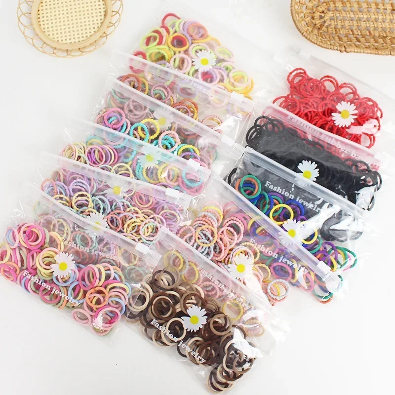 100pcs Chrysanthemum Pocket Small Rings Mini Thumb Hair Rings Baby Small Elastic Cords Not Damaging Head Rope 2cm Elasticity