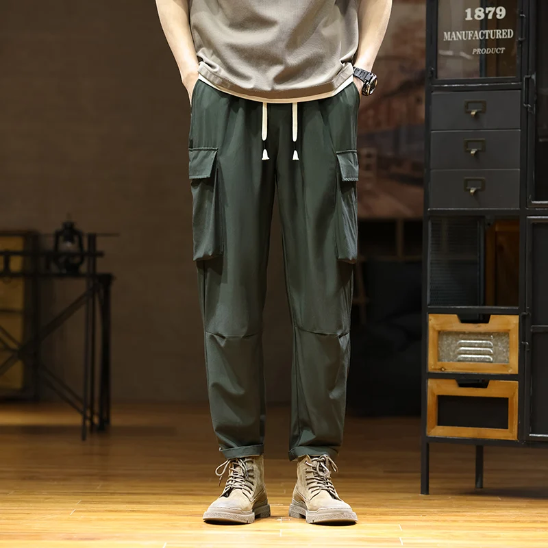 

2024 autumn and winter overalls, men's loose-fitting tights, and plenty of stylish Korean versions of tiny-footed Harlan Pa