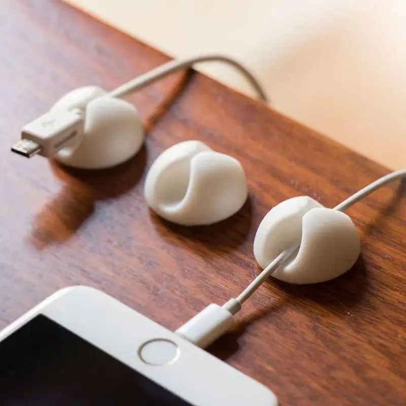 Picture 6: Desktop cable management with data cable holder, storage buckle, headphone charging cable, bedside cable holder