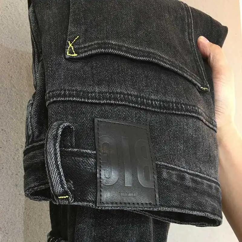 Jeans con tasca inclinata ricamata da uomo di marca alla moda ricamo slim-fit elastico piccolo dritto blu moda pantaloni casual da uomo