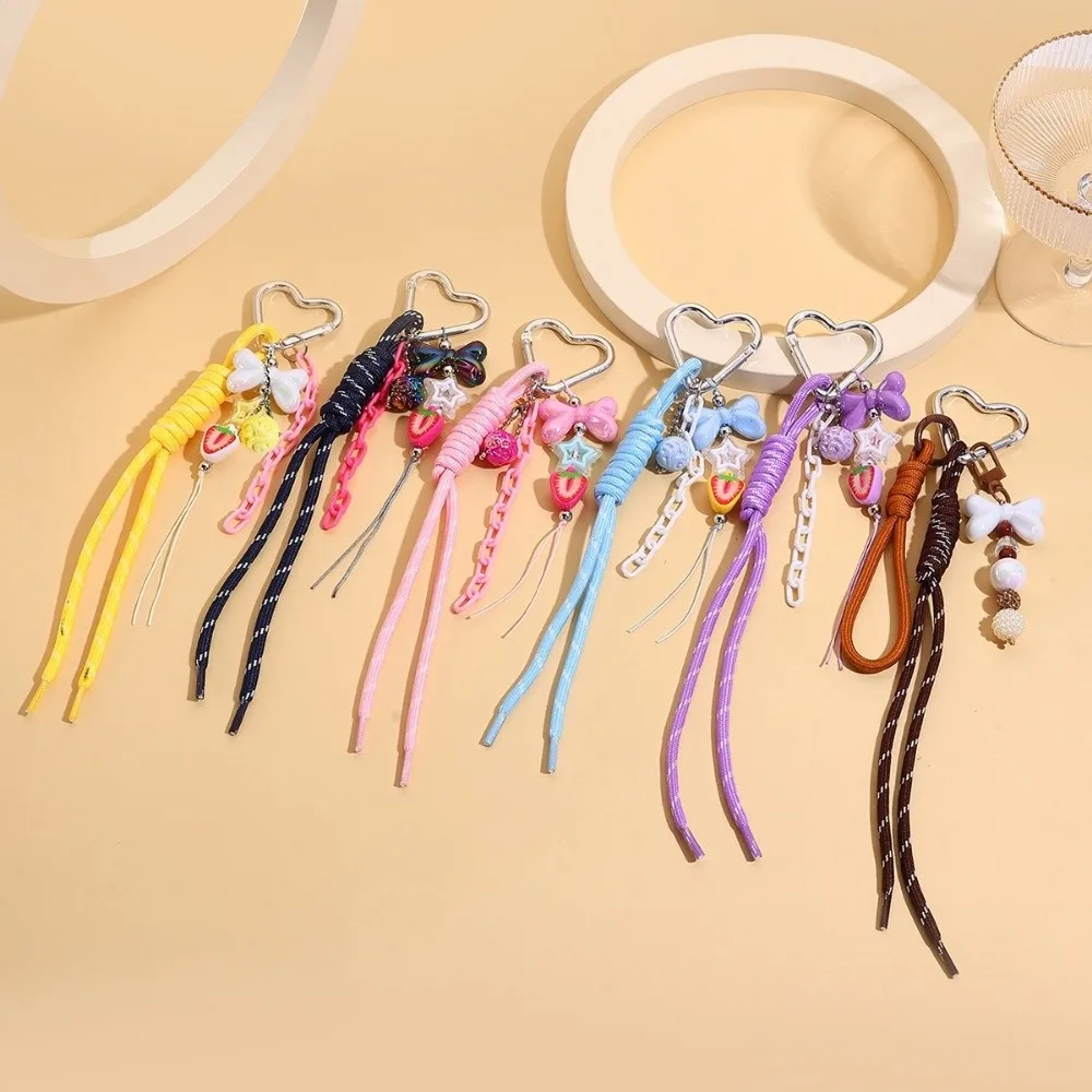 New Colored Hand Woven Keychain Heart Buckle Braided Rope Bag Pendant Leather Bowknot Mobile Phone Lanyard Bag Decoration