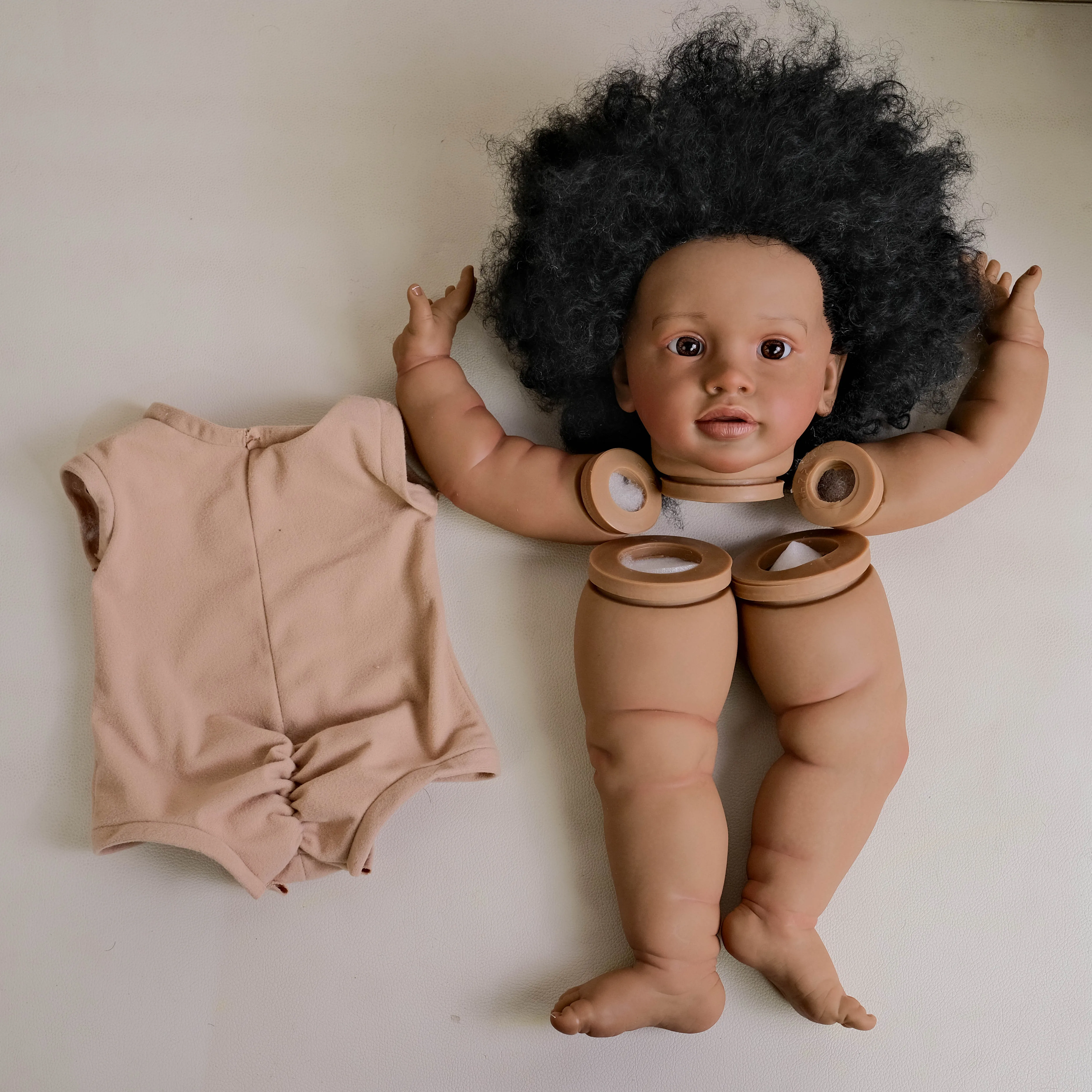 NPK 26-inch Pippa Unfinished Reborn Doll Kit Dark Brown Skin Lifelike DIY Toy Doll Parts with Curly Hair Painted
