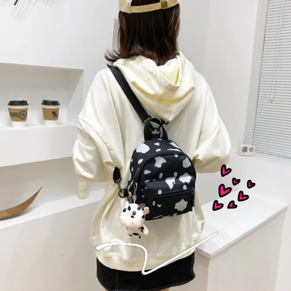 Bolso de viaje portátil con correa ajustable para mujer, Mini mochila multifunción de lona, punto de vaca