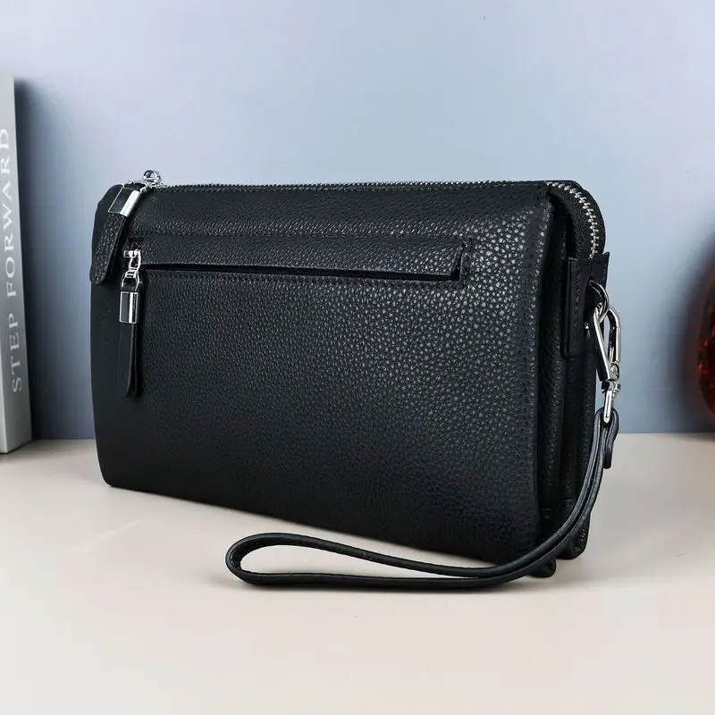 Real leather handbag model spring and summer high-end feeling men's large capacity multi compartment handbag large wallet