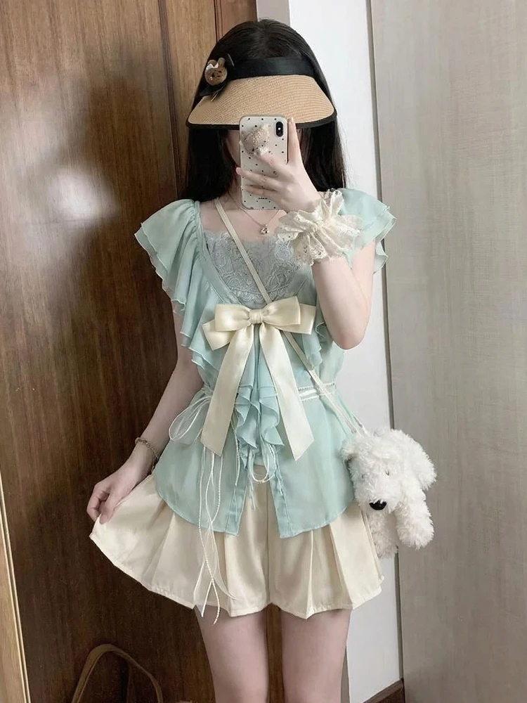 

Винтажный летний комплект из трех предметов: мятно-зеленый открытый кардиган, внутренняя майка и юбка. Женская повседневная модная одежда с высокой талией.