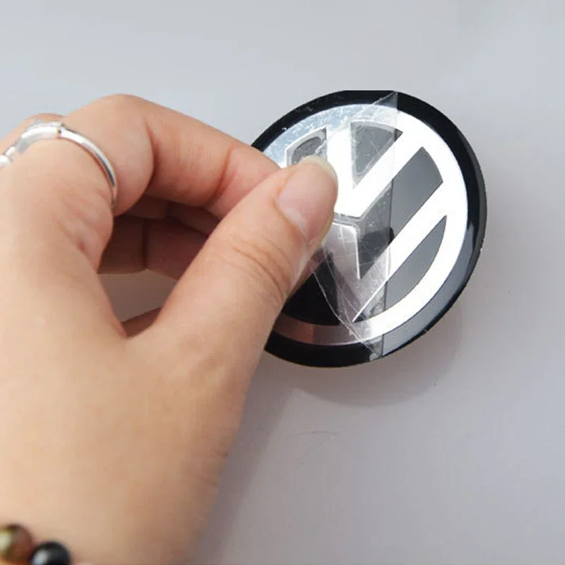 4 قطعة 56 مللي متر ملصقات عجلة السيارة غطاء محور المركزي شعار السيارة شارة مائي ل Volkswagen GTI R-Line R Polo T5 جولف باسات شيروكو