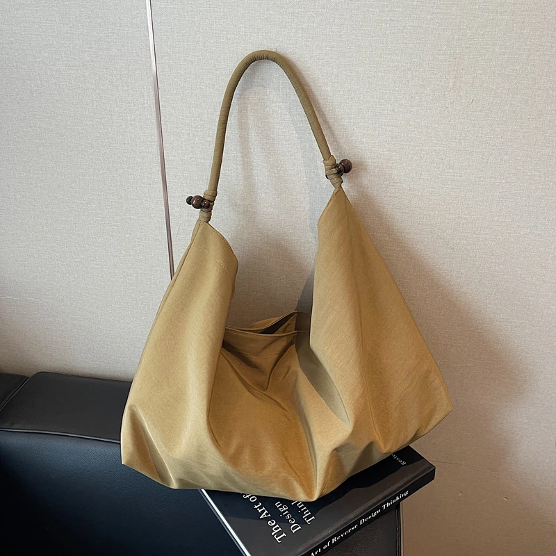 

Solid Color Nylon Large Capacity Shoulder Bags Commuting Sewing Thread Casual Tote Bags 2026 High Quality Retro Bags for Women